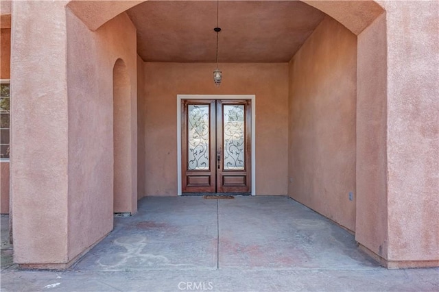 11110 Choctaw Dr, Bakersfield, CA 93308 - view of exterior entry featuring french doors and stucco siding