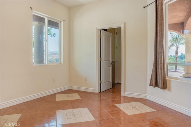 11110 Choctaw Dr, Bakersfield, CA 93308 - tiled spare room with baseboards