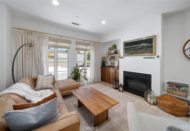 1212 Carmel St, San Luis Obispo, CA 93401 - living area with recessed lighting and a glass covered fireplace