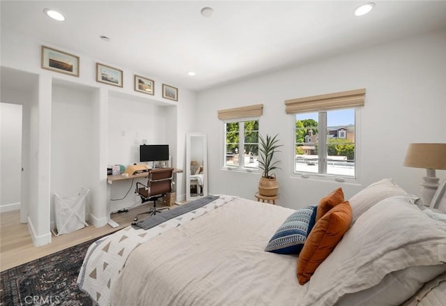 1212 Carmel St, San Luis Obispo, CA 93401 - bedroom with a desk, wood finished floors, and recessed lighting