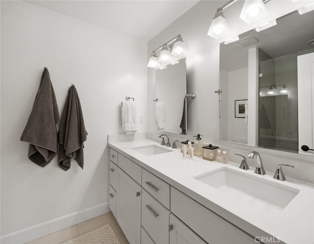 1212 Carmel St, San Luis Obispo, CA 93401 - bathroom with double vanity, tile patterned floors, and a shower