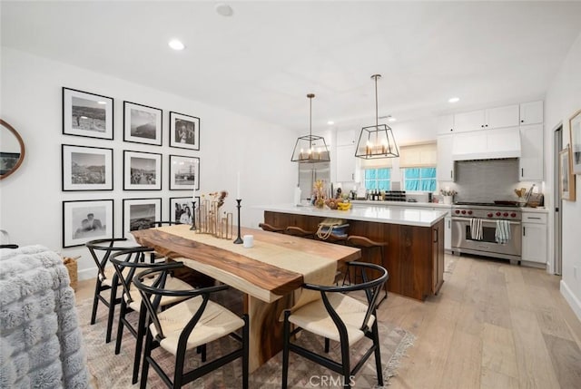 1212 Carmel St, San Luis Obispo, CA 93401 - dining area with recessed lighting and light wood-style floors