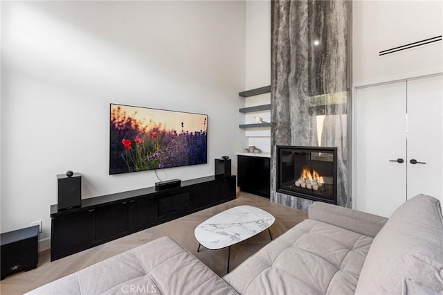 45 Morena, Irvine, CA 92612 - living room with a fireplace and a towering ceiling