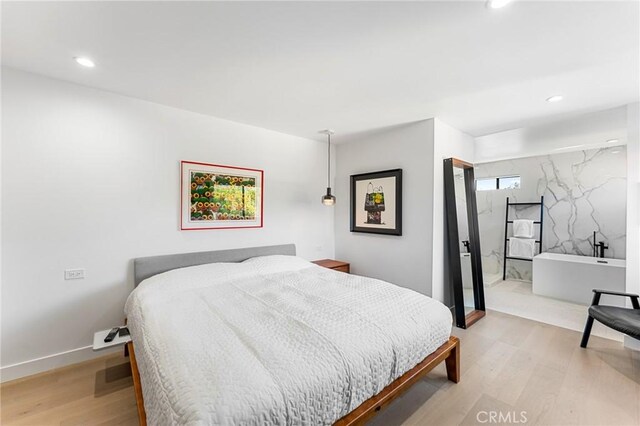 45 Morena, Irvine, CA 92612 - bedroom featuring recessed lighting and light wood-style flooring