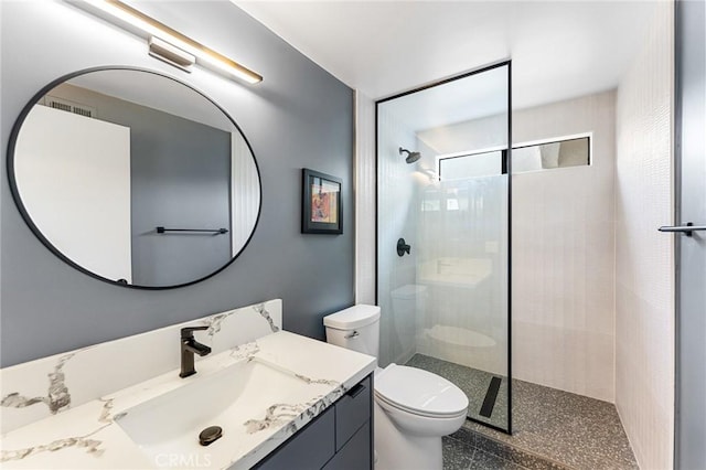 45 Morena, Irvine, CA 92612 - bathroom with vanity, walk in shower, and speckle patterned floor