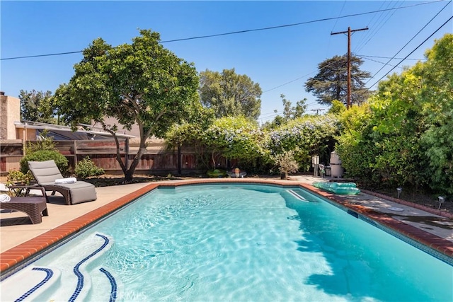 6535 Mary Ellen Ave, Valley Glen, CA 91401 - view of swimming pool with a fenced backyard and a patio area