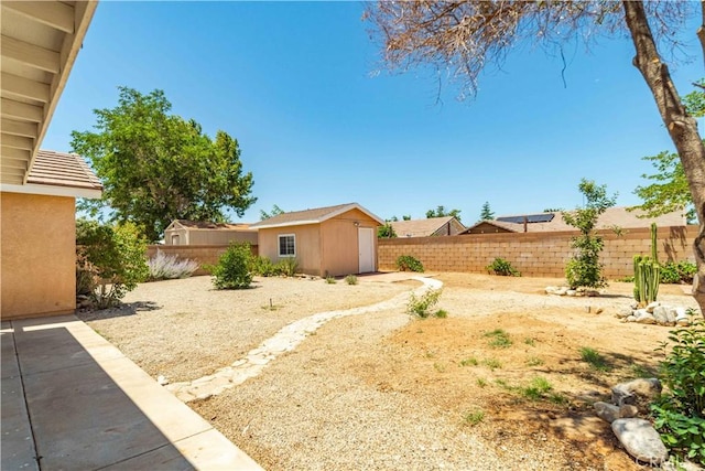 43733 6th St E, Lancaster, CA 93535 - fenced backyard featuring an outbuilding