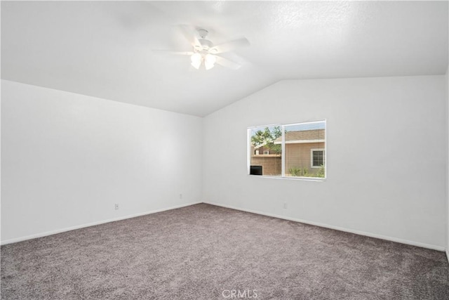 43733 6th St E, Lancaster, CA 93535 - empty room featuring a ceiling fan, carpet flooring, and vaulted ceiling
