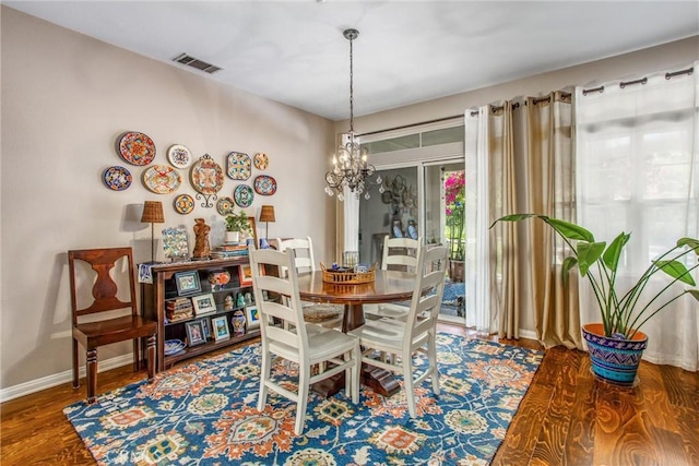 512 Golden W Dr, Redlands, CA 92373 - dining room with a chandelier and wood finished floors