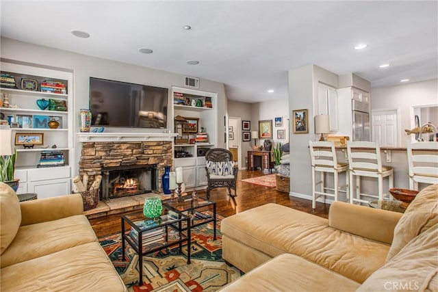 512 Golden W Dr, Redlands, CA 92373 - living area with a stone fireplace, wood finished floors, and recessed lighting