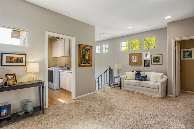 512 Golden W Dr, Redlands, CA 92373 - living room featuring washer / clothes dryer, light colored carpet, and recessed lighting