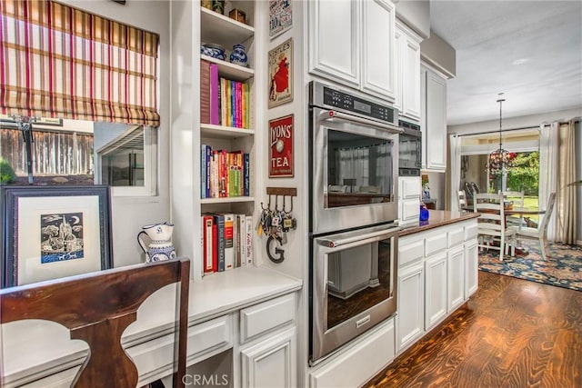 512 Golden W Dr, Redlands, CA 92373 - kitchen featuring double oven, dark wood finished floors, white cabinetry, and open shelves