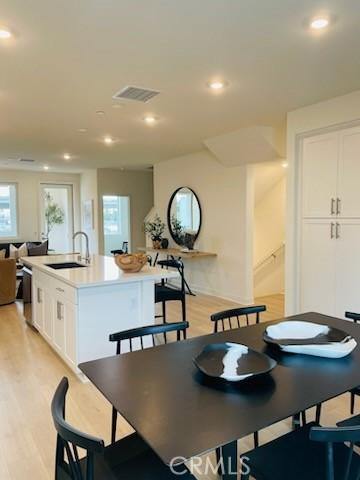 1810 E 1st St Unit 170, Santa Ana, CA 92705 - dining area featuring light wood finished floors and recessed lighting