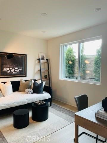 1810 E 1st St Unit 170, Santa Ana, CA 92705 - living area with wood finished floors and baseboards