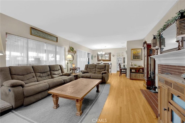 15902 Santa Fe St, Whittier, CA 90603 - living room with a chandelier and light wood-type flooring