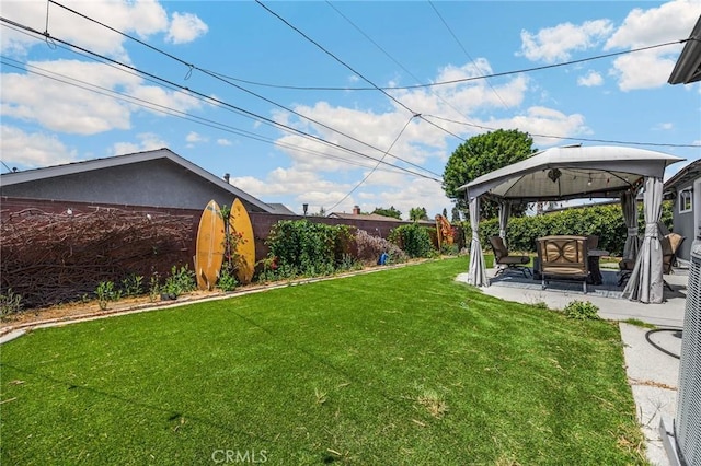 15902 Santa Fe St, Whittier, CA 90603 - fenced backyard with a gazebo, outdoor lounge area, and a patio area