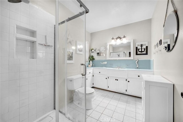 15902 Santa Fe St, Whittier, CA 90603 - bathroom with a stall shower, vanity, backsplash, and tile patterned floors