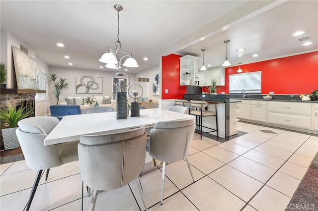19615 E Tudor St, Covina, CA 91724 - dining room featuring recessed lighting, plenty of natural light, a chandelier, and light tile patterned flooring