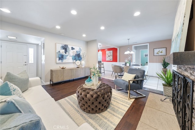 19615 E Tudor St, Covina, CA 91724 - living area featuring wood finished floors, recessed lighting, and plenty of natural light