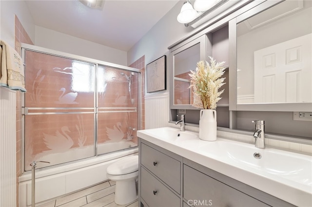 19615 E Tudor St, Covina, CA 91724 - full bathroom featuring combined bath / shower with glass door and double vanity