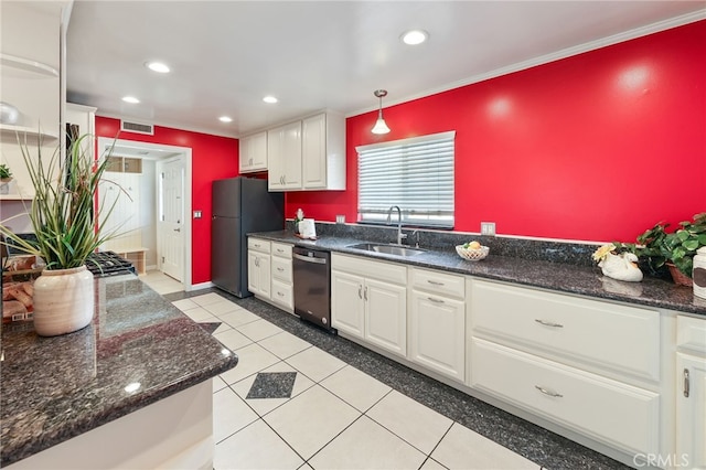 19615 E Tudor St, Covina, CA 91724 - kitchen with stainless steel dishwasher, freestanding refrigerator, white cabinetry, ornamental molding, and recessed lighting