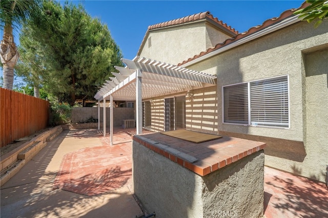 11500 Winery Dr, Fontana, CA 92337 - fenced backyard featuring a patio area and a pergola