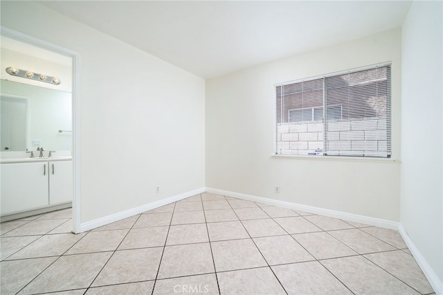 11500 Winery Dr, Fontana, CA 92337 - unfurnished room featuring a sink and light tile patterned floors