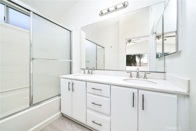 11500 Winery Dr, Fontana, CA 92337 - full bathroom featuring a ceiling fan, double vanity, combined bath / shower with glass door, and marble finish floors