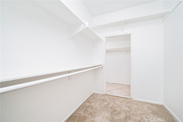 11500 Winery Dr, Fontana, CA 92337 - walk in closet featuring carpet flooring