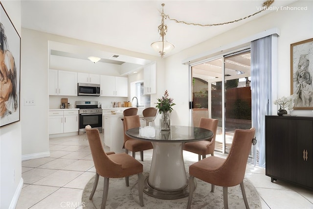11500 Winery Dr, Fontana, CA 92337 - dining space with light tile patterned floors and baseboards