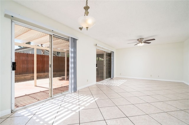 11500 Winery Dr, Fontana, CA 92337 - empty room featuring ceiling fan and light tile patterned floors