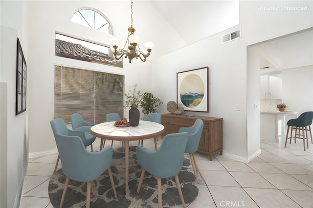 11500 Winery Dr, Fontana, CA 92337 - dining space with a chandelier, light tile patterned floors, and high vaulted ceiling