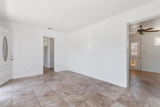 18713 Vanowen St, Reseda, CA 91335 - unfurnished room with a ceiling fan and light tile patterned floors