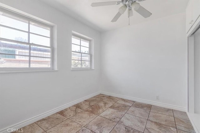 18713 Vanowen St, Reseda, CA 91335 - unfurnished room with baseboards and ceiling fan