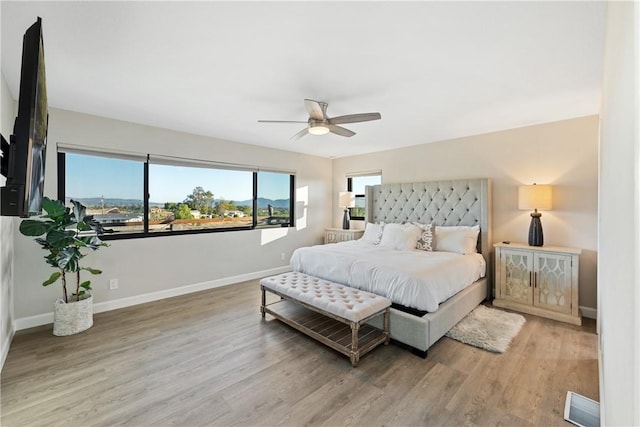 33851 Madera De Playa, Temecula, CA 92592 - bedroom with wood finished floors and a ceiling fan