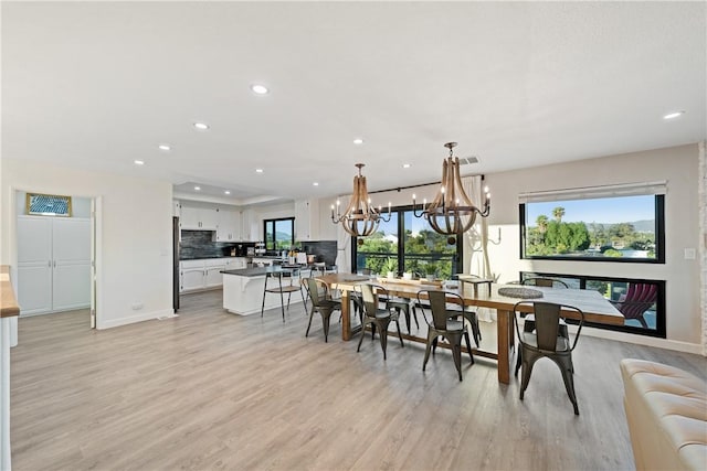 33851 Madera De Playa, Temecula, CA 92592 - dining space featuring a chandelier, recessed lighting, and light wood-type flooring