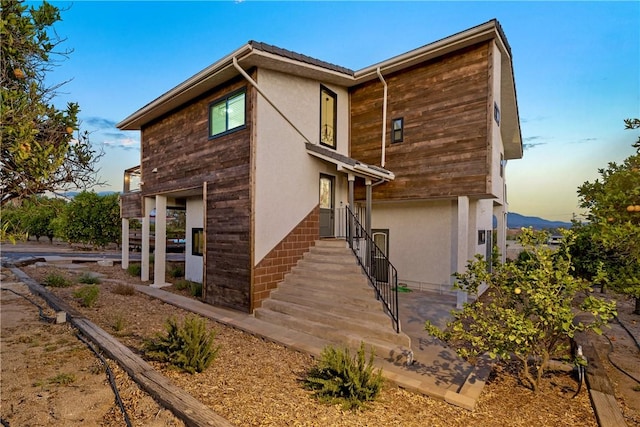 33851 Madera De Playa, Temecula, CA 92592 - view of side of property featuring stucco siding