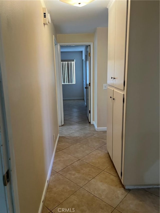 1441 Edgewood Ln, Hemet, CA 92543 - hallway with light tile patterned flooring