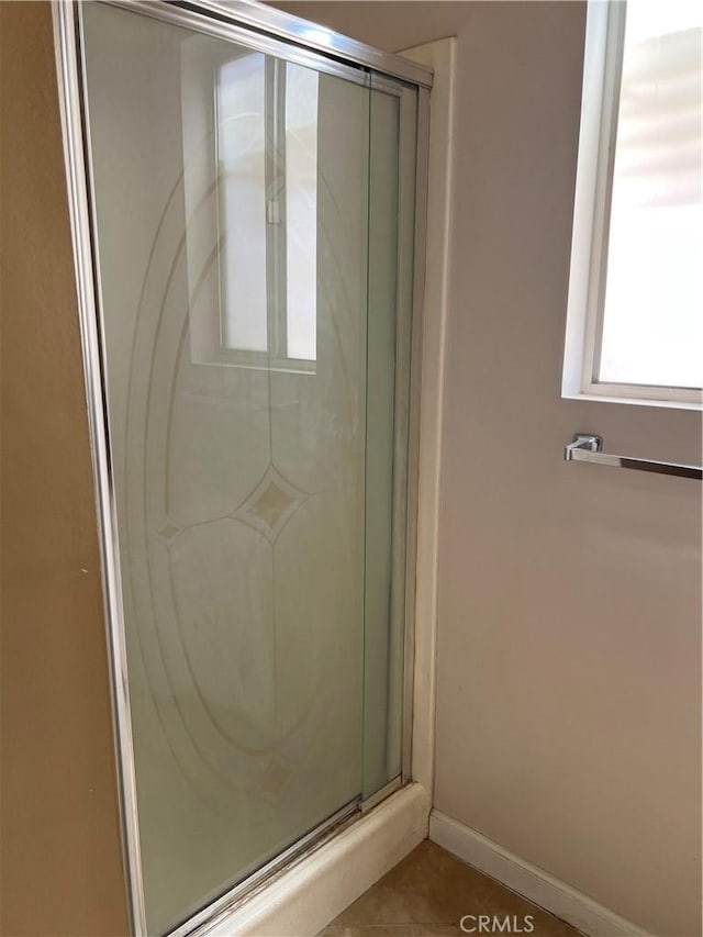 1441 Edgewood Ln, Hemet, CA 92543 - bathroom featuring a shower stall and tile patterned flooring