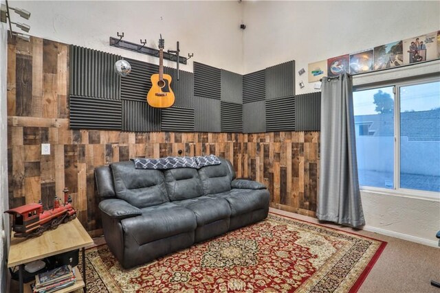 6073 Cameo St, Rancho Cucamonga, CA 91701 - living area with carpet flooring and wooden walls