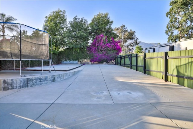 6073 Cameo St, Rancho Cucamonga, CA 91701 - view of community featuring a trampoline and a mountain view