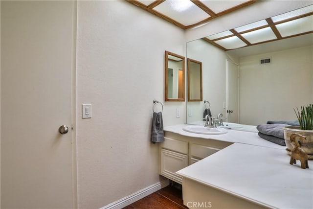 6073 Cameo St, Rancho Cucamonga, CA 91701 - bathroom featuring wood finished floors and vanity