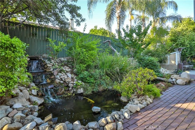 6073 Cameo St, Rancho Cucamonga, CA 91701 - view of yard with a garden pond and a patio