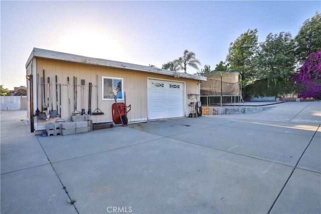 6073 Cameo St, Rancho Cucamonga, CA 91701 - view of property exterior with a trampoline, a garage, and concrete driveway