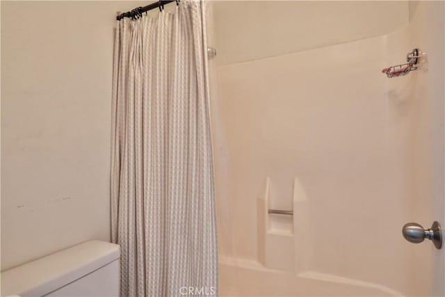 6073 Cameo St, Rancho Cucamonga, CA 91701 - bathroom with toilet and shower / bathtub combination with curtain