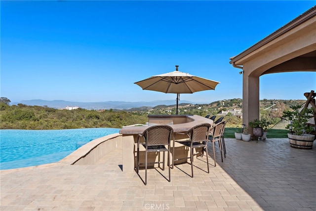 38150 Via Huerta, Murrieta, CA 92562 - view of patio / terrace featuring a mountain view