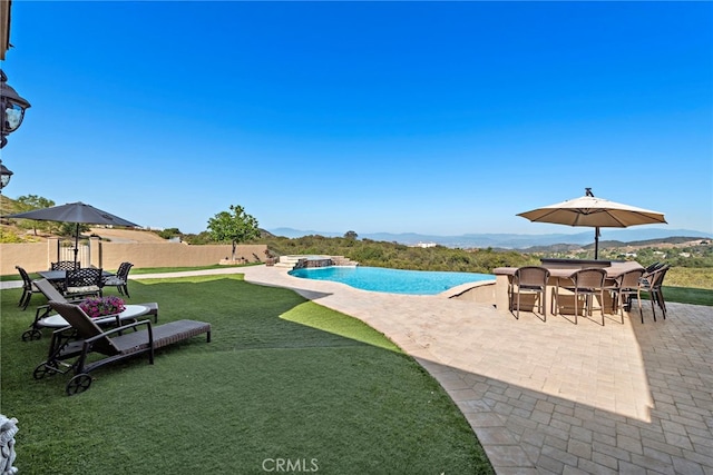 38150 Via Huerta, Murrieta, CA 92562 - view of pool with a patio, an infinity pool, and a mountain view