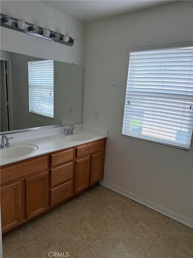 18318 Whitewater Way, Riverside, CA 92508 - bathroom featuring double vanity and baseboards