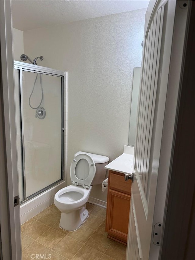 18318 Whitewater Way, Riverside, CA 92508 - full bathroom featuring vanity, a shower stall, and tile patterned floors