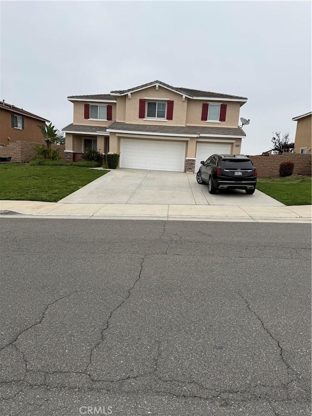 18318 Whitewater Way, Riverside, CA 92508 - traditional-style home with a garage, driveway, stucco siding, and a front lawn